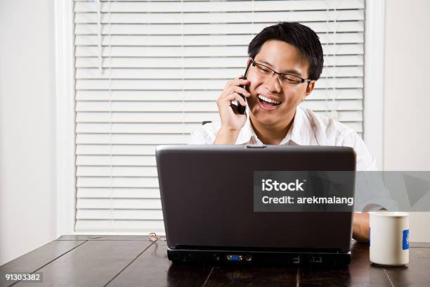 Asian Entrepreneur On The Phone Stock Photo - Download Image Now - 20-29 Years, Adult, Business