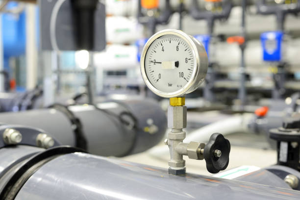 istock new shiny pipes in industrial boiler room 913038706