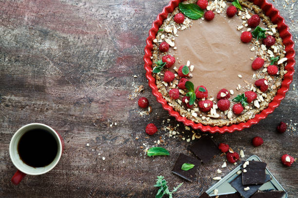 istock Raw vegan chocolate tart decorated with berries 913048982