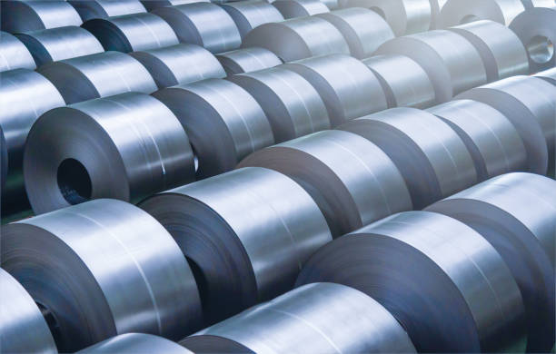 Cold rolled steel coil at storage area in steel industry plant. Cold rolled steel coil at storage area in steel industry plant. five cent coin stock pictures, royalty-free photos & images