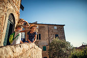 Family enjoying sightseeing small italian town