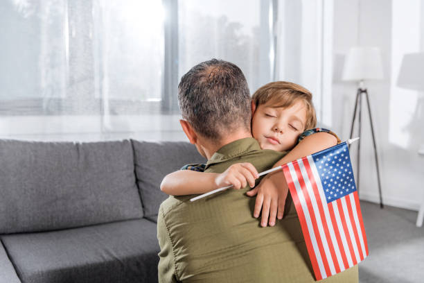 istock american father and son embracing 913059264