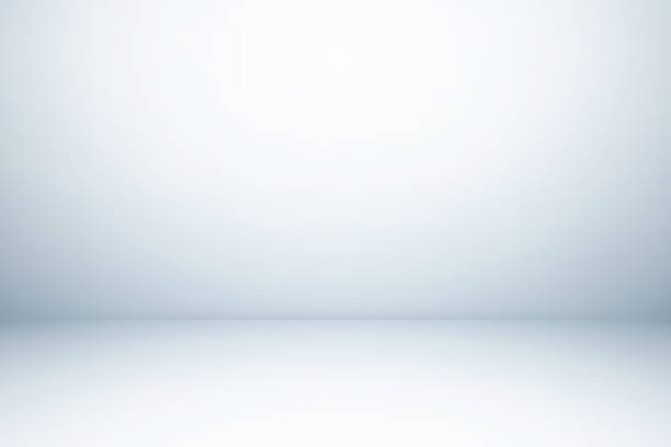 Empty gray studio room, used as background for display your products Empty gray studio room, used as background for display your products spotlight photos stock pictures, royalty-free photos & images