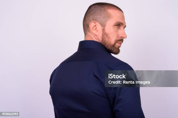 Portrait Of Businessman Against White Background Stock Photo - Download Image Now - Men, Profile View, Portrait