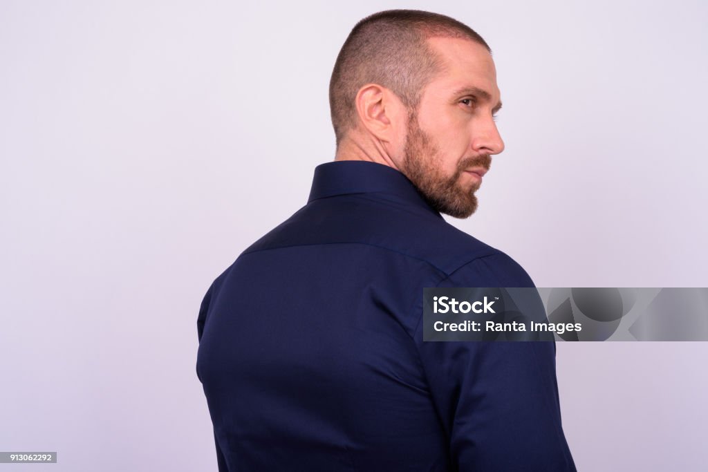 Retrato do empresário contra o fundo branco - Foto de stock de Homens royalty-free