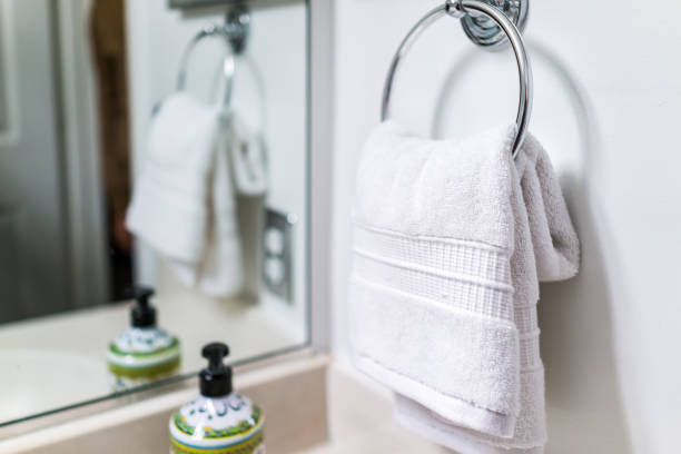 Staging Modern Bathroom With One Decorated Towel Hanging On Rack By Sink In  Model Home Apartment Or House Stock Photo - Download Image Now - iStock