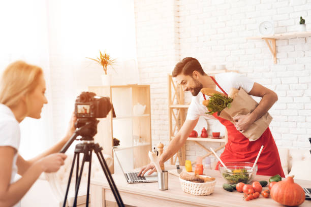 istock Chef presenting food ingrdients for culinary podcast camera. 913065898