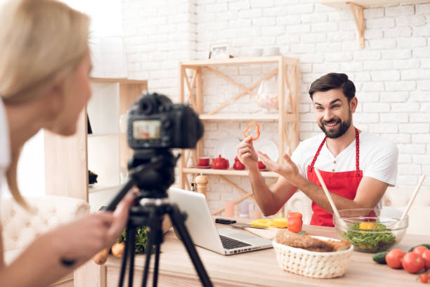 istock Chef prepering food ingredients for culinary podcst viewers. 913065948