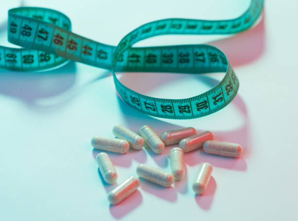 diet pells diet plan diet pills stock pictures, royalty-free photos & images