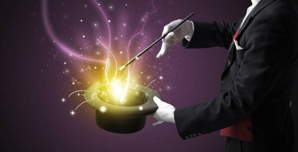 istock Magician hand conjure miracle from cylinder 913066254