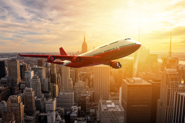 istock Airplane flying over a metropoly 913072356
