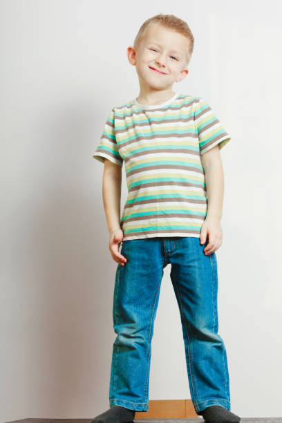 istock Happy kid boy looking straight to camera 913072716