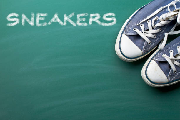 istock vintage sneakers on green chalkboard 913076202