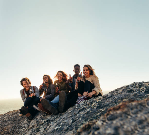 istock Multi-ethnic friends partying on mountain top 913084310