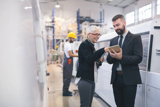 quality inspectors at the factory - drawing women expertise business imagens e fotografias de stock