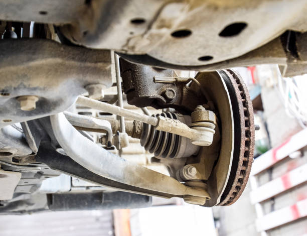 istock Forged car for a hundred. Car repair. Car view from below 913098664
