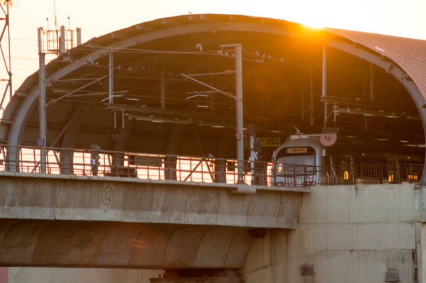 Jaipur metro station shot at sunset with the golden glow of the light still there. The metro is making inter city transportation much easier and faster