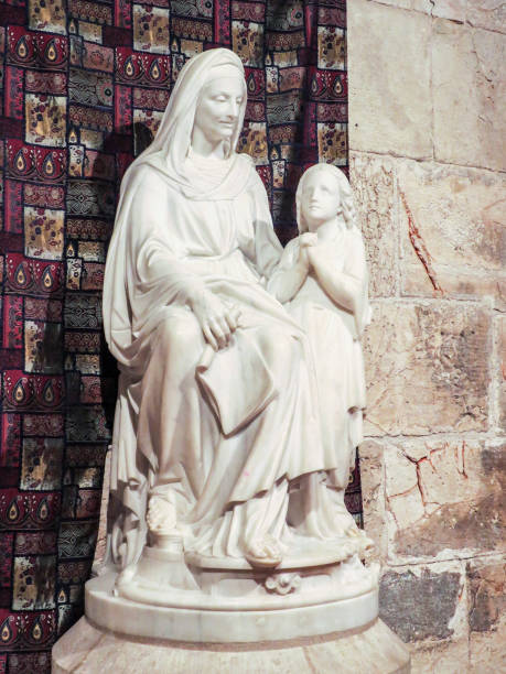 Jerusalem, Israel Jerusalem, Israel - The marble statue of St. Anne with the Virgin Mary in St. Anne gothic church (first station of Via Dolorosa) tomb of the virgin mary in jerusalem stock pictures, royalty-free photos & images