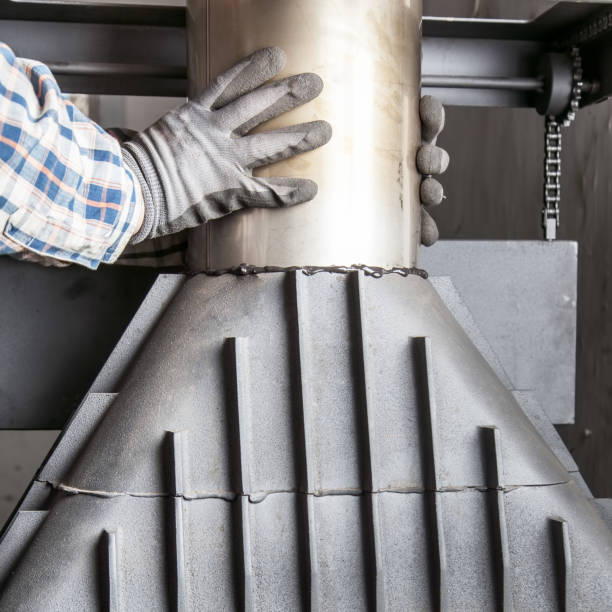 Chimney installation on modern cast iron fireplace