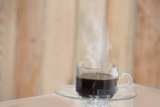 istock Hot coffee on wooden background. 913121484