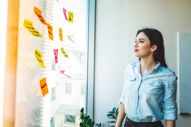 istock A young businesswomen trying to find the right solution 913121780