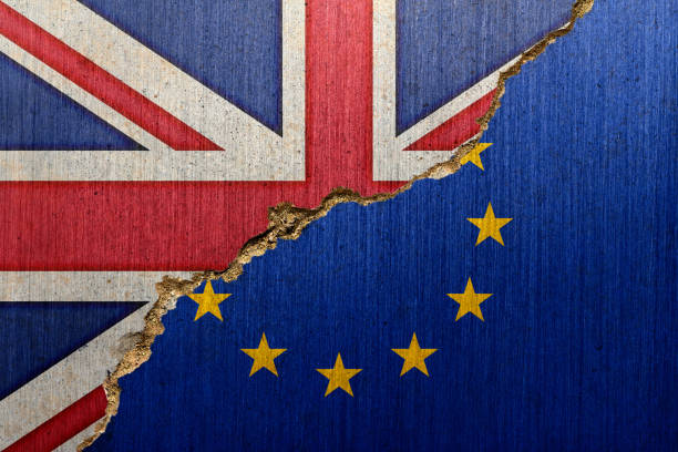 istock Flags of UK and EU on a Creacked Concrete 913125162