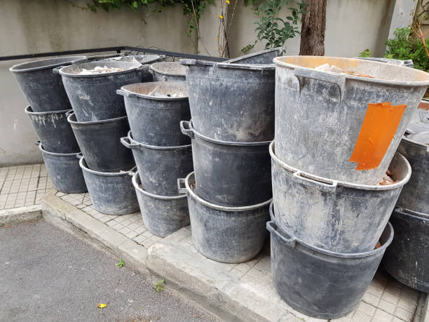 istock Pile of plastic construction buckets on construction site background, Construction site, home renovation. 913168712
