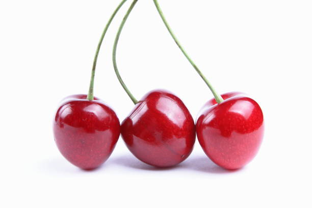 istock Red cherries on white background, isolated, cherry with blank space for text, fresh red berries, label for designer, vegan, healthy food, cherry 913168720