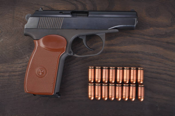 istock 9mm russian handgun with ammunitions 913169214