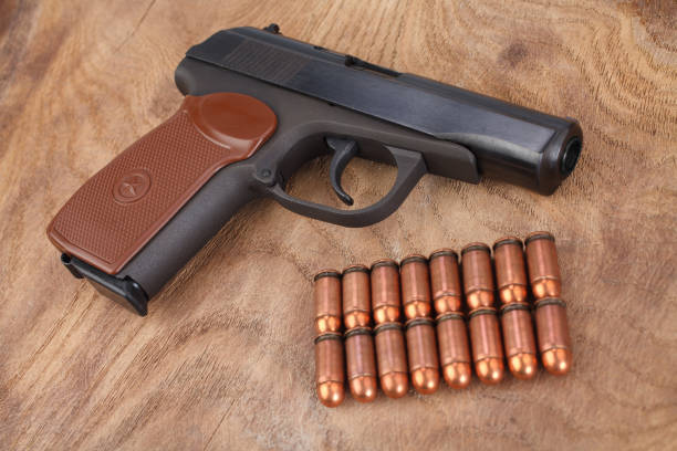 istock 9mm russian handgun with ammunitions 913169260