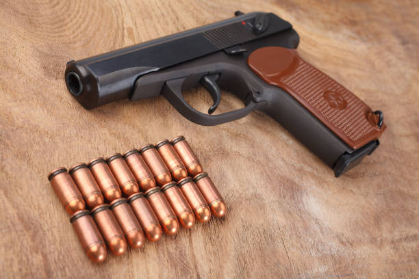 istock 9mm russian handgun with ammunitions 913171484