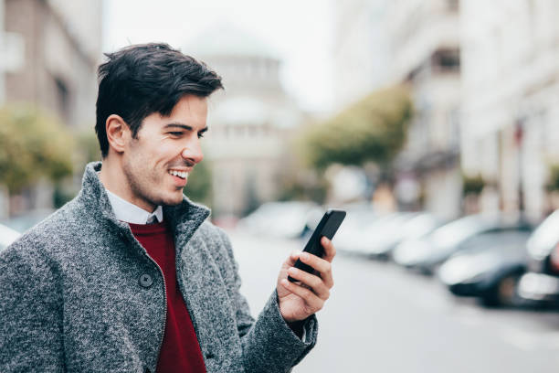 istock Man texting in the city 913175852