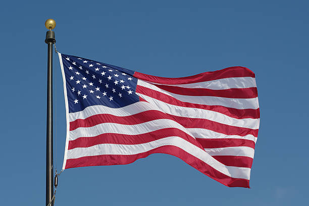 istock Waving american flag against blue sky 91317604