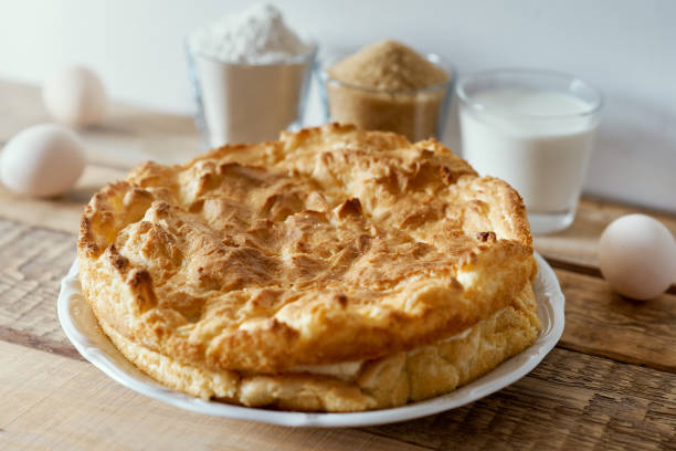 istock delicious cake, eggs, flour, milk and sugar on a wooden table 913178134
