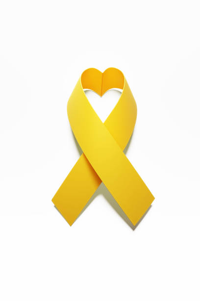 Heart shaped yellow ribbon. Support our troops and give us hope concept. Vertical composition with clipping path and copy space.