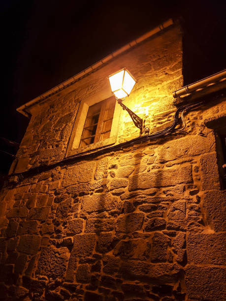 istock Streetlight and window at night 913189770