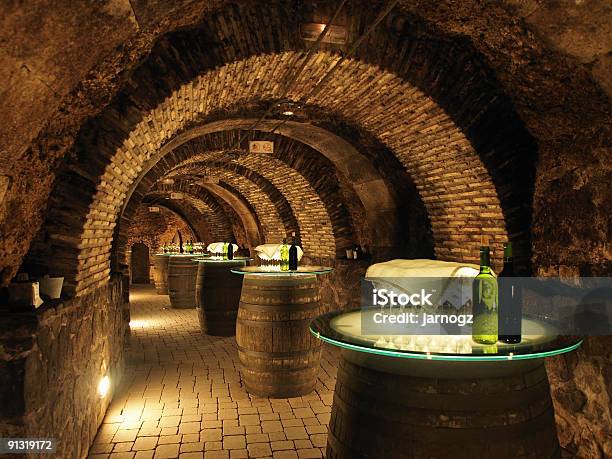 Wine Barrels In The Old Cellar Of A Winery Stock Photo - Download Image Now - Wine Cellar, Wine Tasting, Cellar