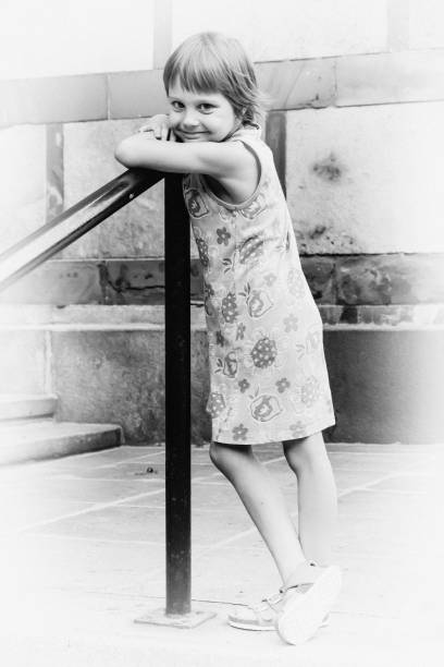 istock A girl in a dress poses 913193034