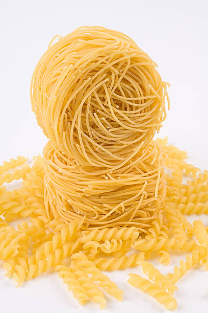 Pasta rolls stacked stock photo
