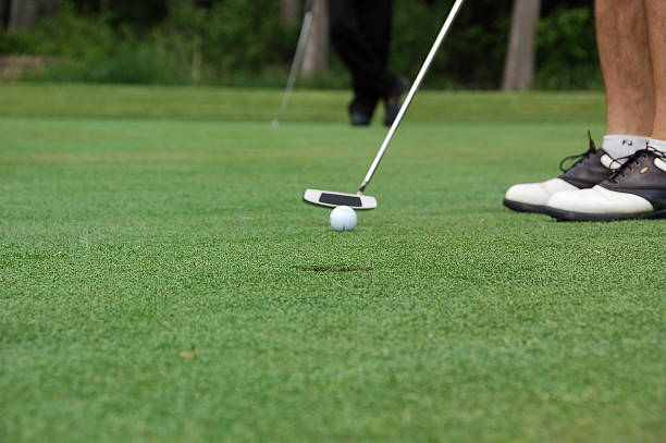 istock Golfer putting on the green. 91320718
