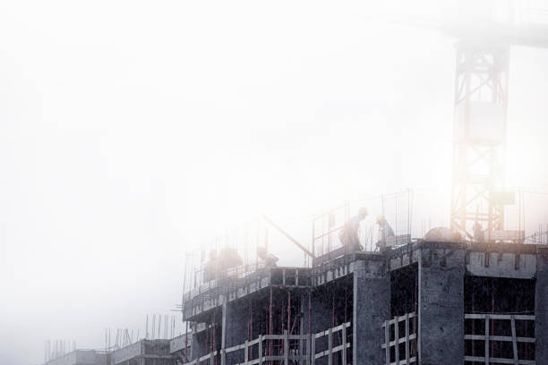 Industrial Crane, safety net, cement formworks mold clear blue sky sunny day