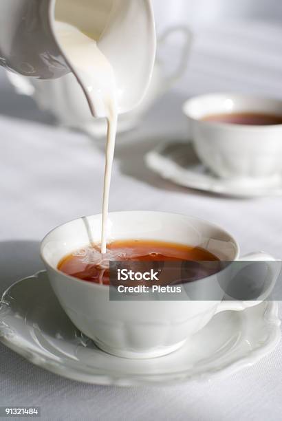 Pouring Milk Stock Photo - Download Image Now - Milk, Tea - Hot Drink, Black Tea
