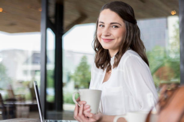 istock Confident college student in trendy coffee shop 913216874
