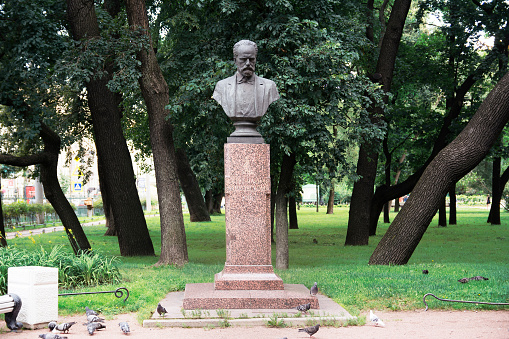 St. Petersburg, Russia - Jule 10, 2016 Granite bust to the composer Peter Ilyich Tchaikovsky in the Tavrichesky Garden of St. Petersburg