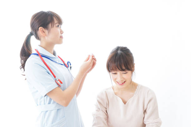 istock Nurse and young woman patient 913233888