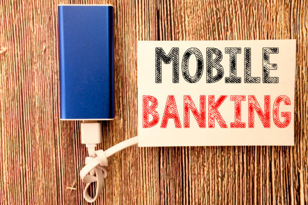 istock Conceptual hand writing text caption inspiration showing Mobile Banking. Business concept for Internet Banking e-bank written on sticky note old wood wooden background with power bank 913234342