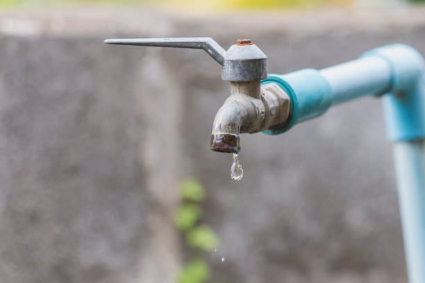 istock Faucet with a water drop / Water consumption concept 913240772