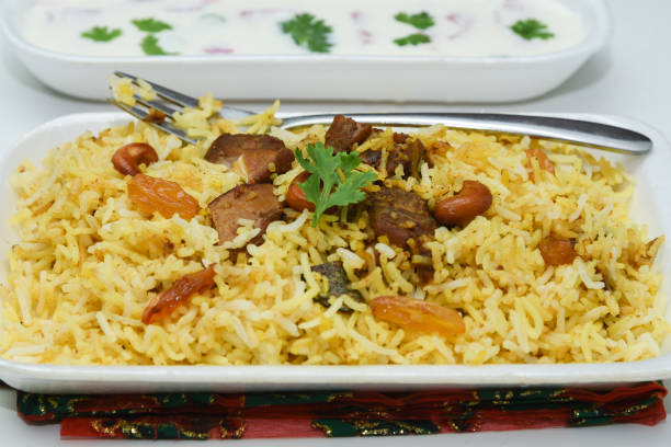 istock Biryani or biriyani Indian dish cooked basmati rice pulav 913241204