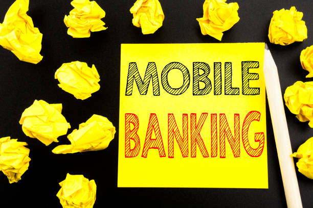 istock Handwritten text showing Mobile Banking. Business concept writing for Internet Banking e-bank written on sticky note paper on the black background. Folded yellow papers on the background 913241454