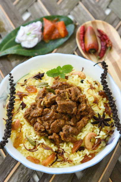 istock Biryani or biriyani Indian dish cooked basmati rice pulav 913241736